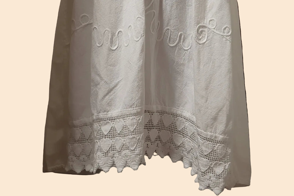 Lace and heart details on halter dress